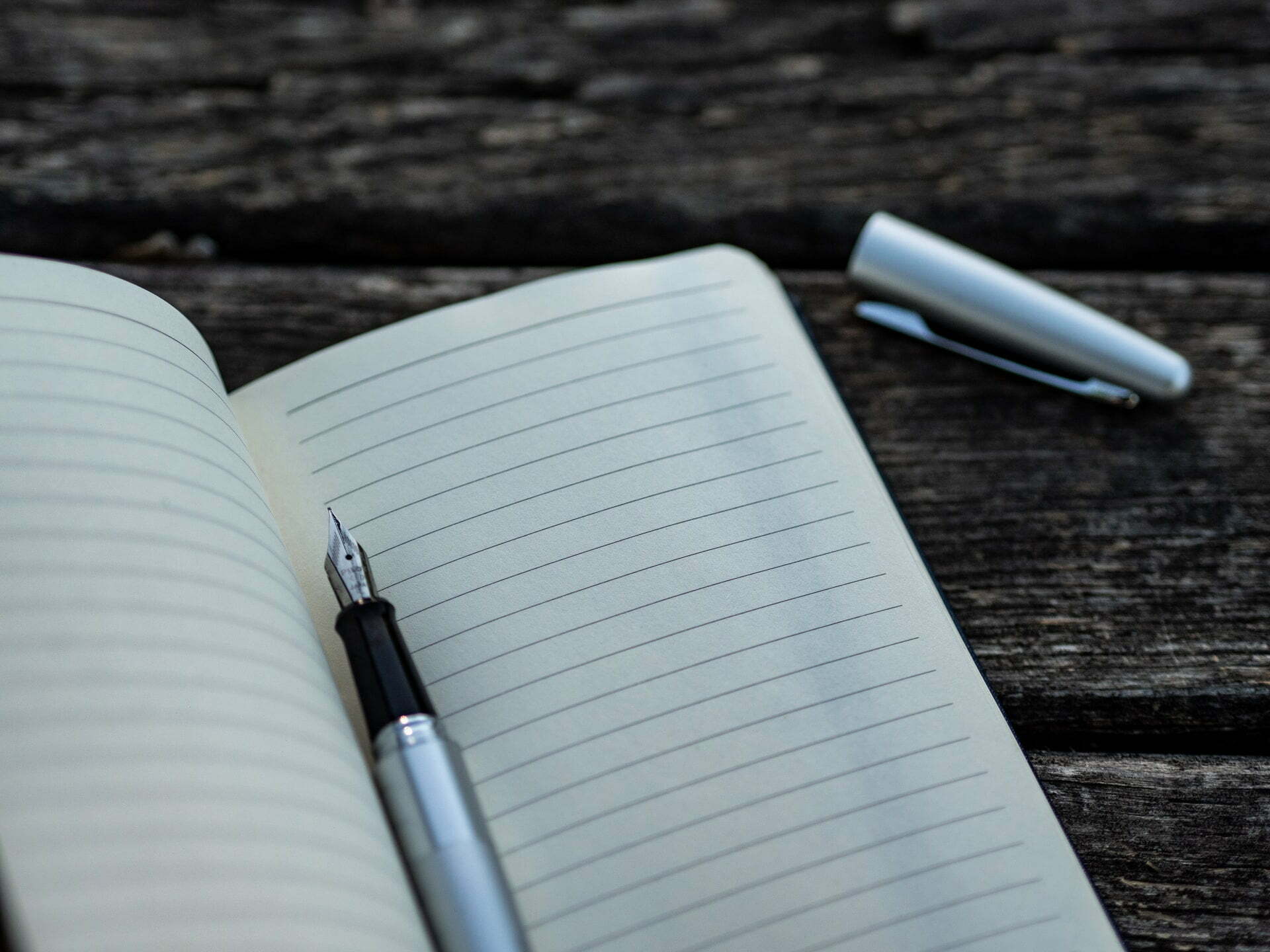 a pen on a book