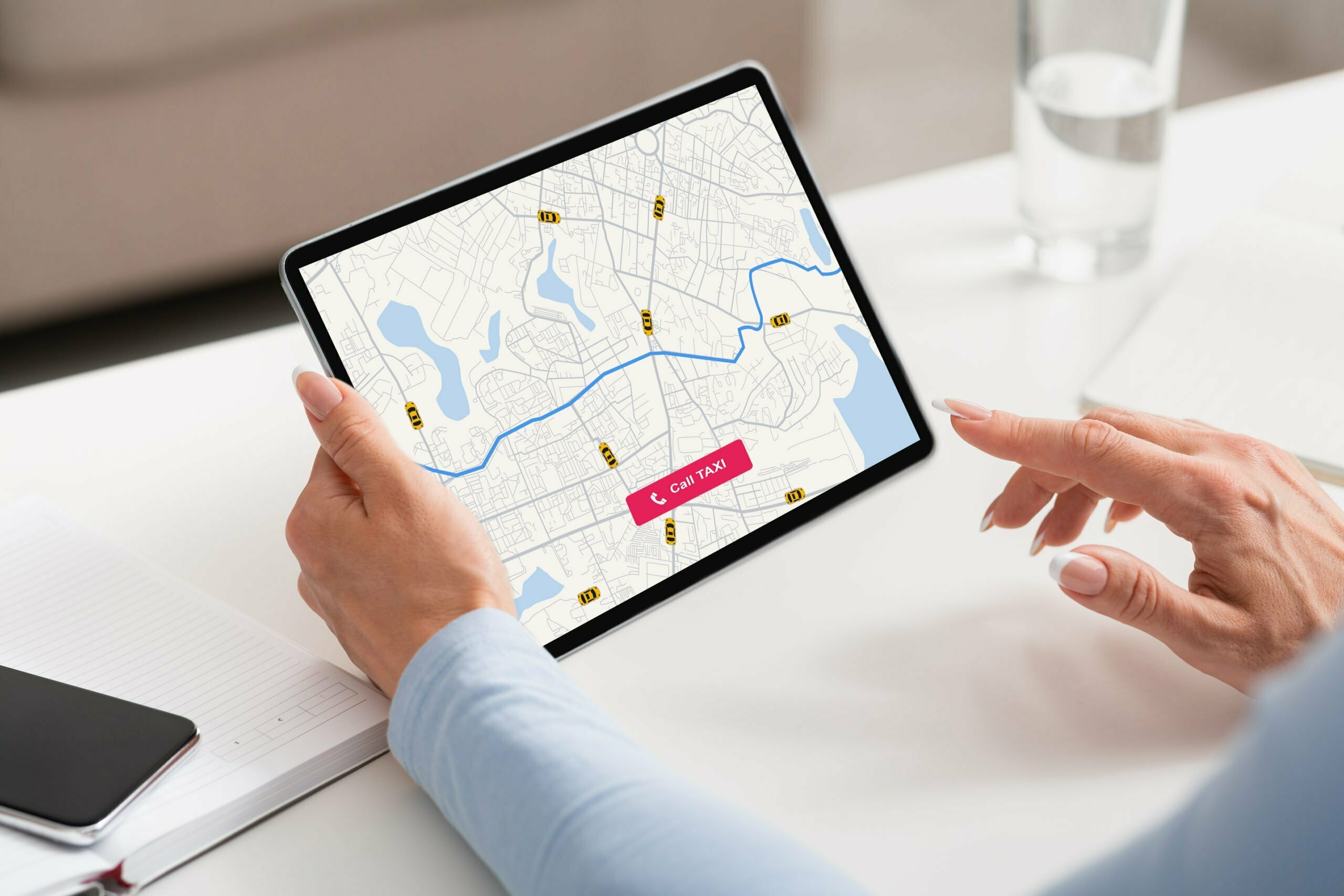 Online Taxi Service. Businesswoman Checking Cab Geolocation On Digital Tablet In Office