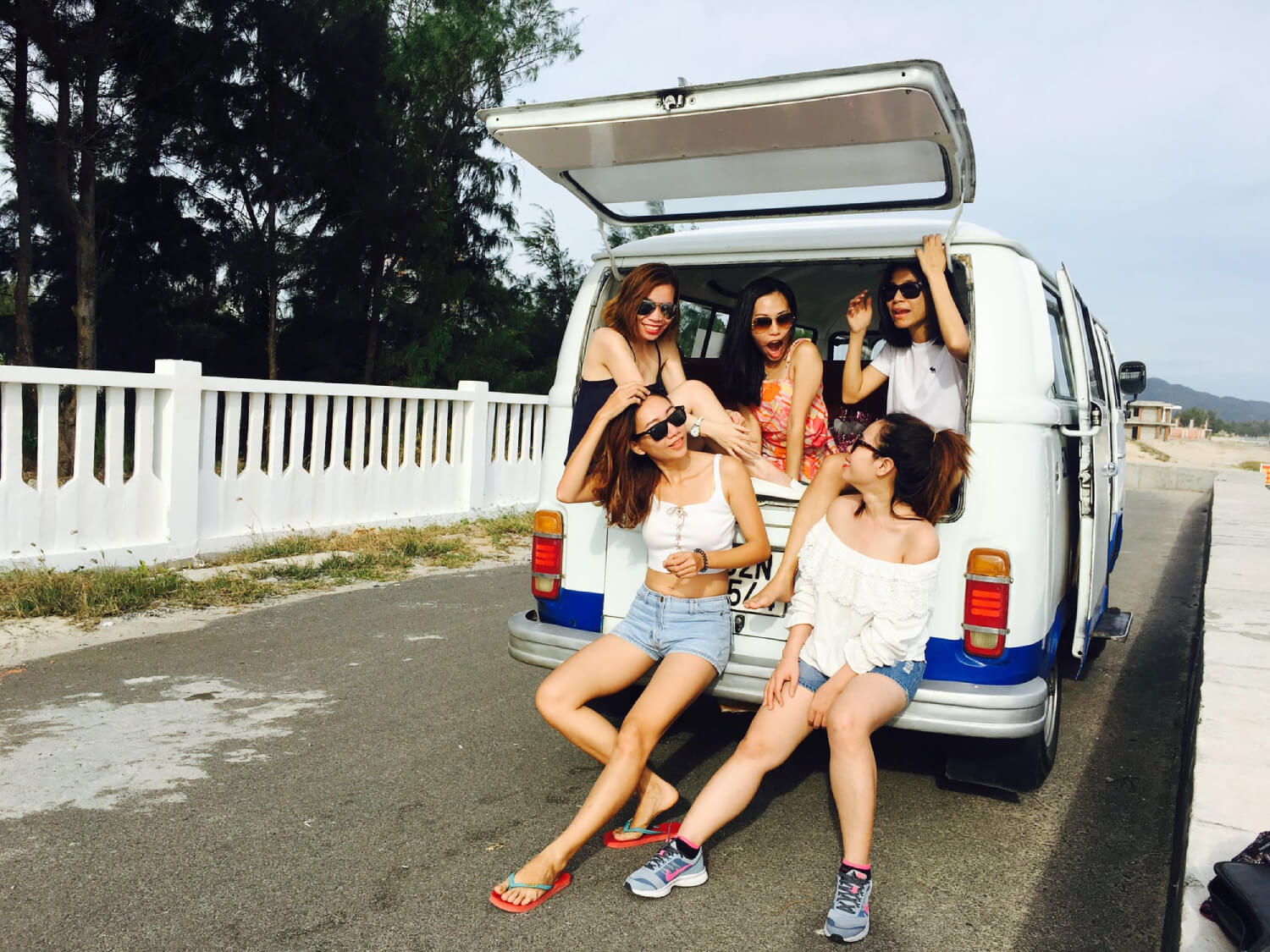 a group of people sitting on a car