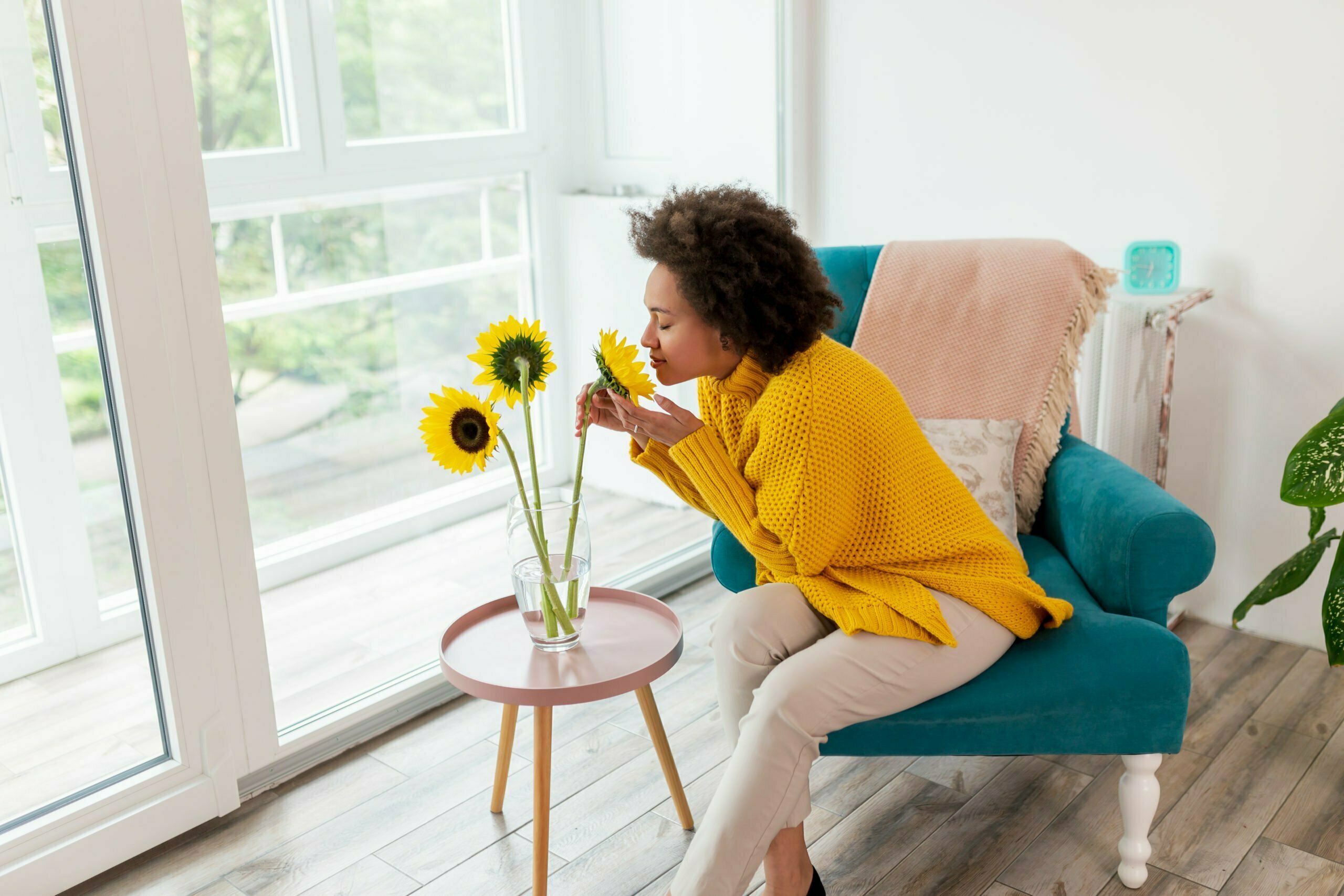 Woman smelling flowers