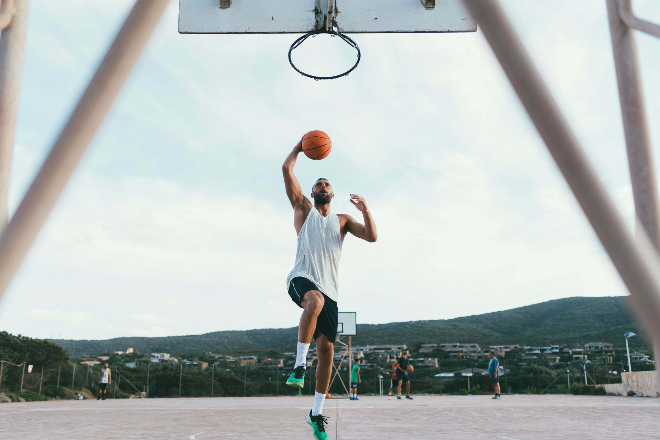 young-man-playing-basketball