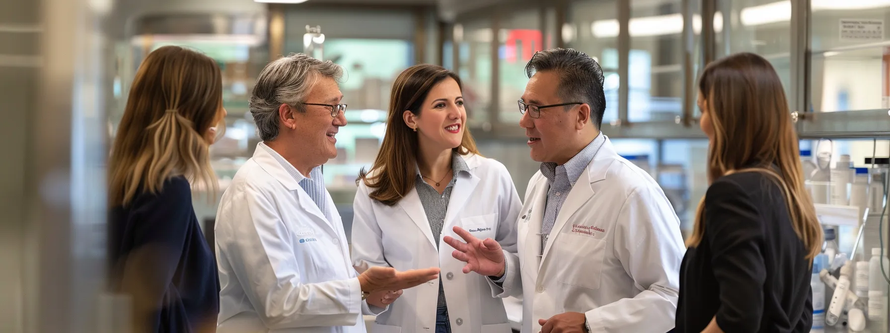 a group of business professionals discussing the positive outcomes of dr. marty's nutritional philosophy on pet health.